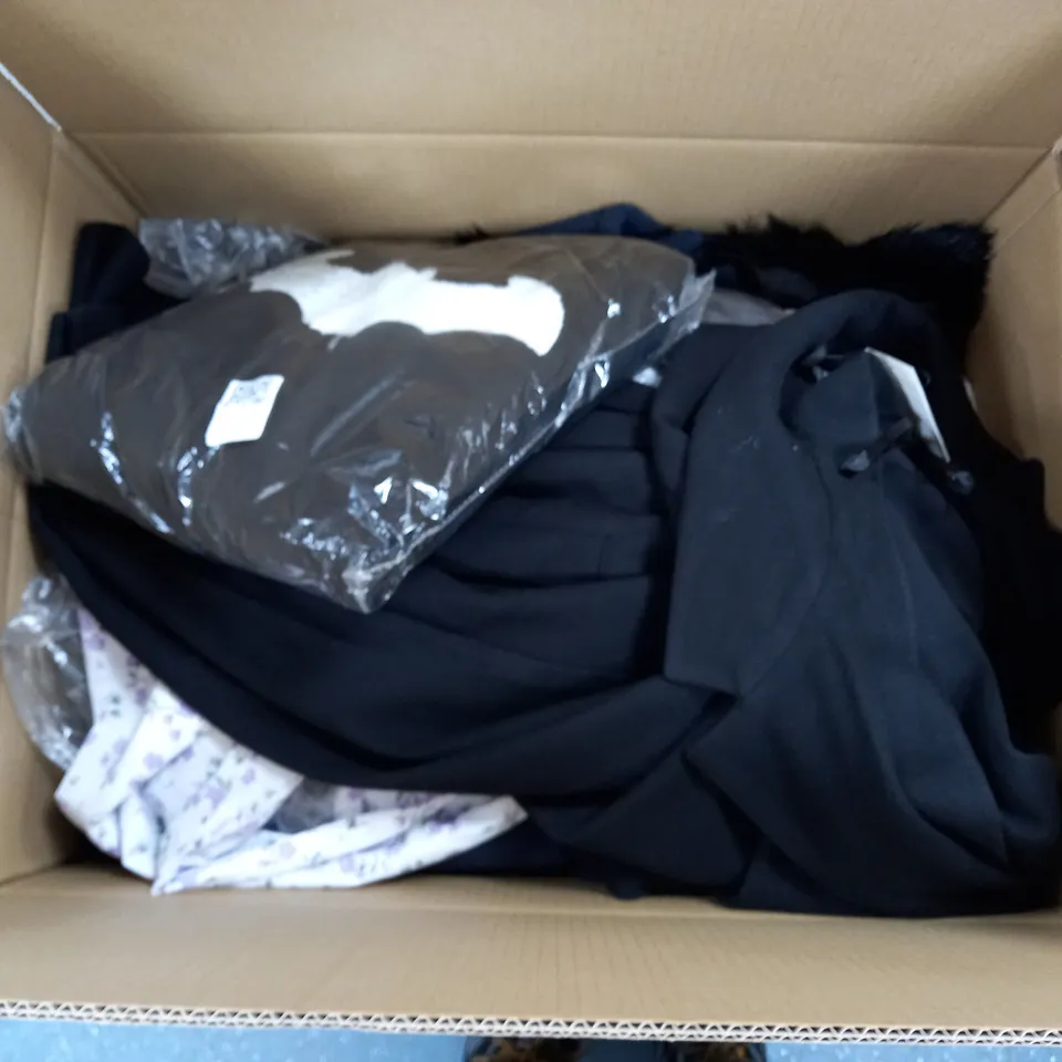 LARGE BOX OF ASSORTED CLOTHING ITEMS IN VARIOUS COLOURS AND SIZES INCLUDING TROUSERS , TOPS AND JUMPERS