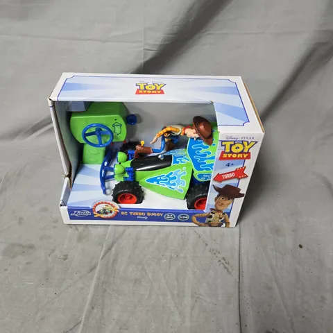 DISNEY PIXAR TOY STORY RC TURBO BUGGY WOODY – BOXED