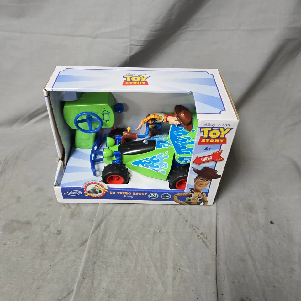 DISNEY PIXAR TOY STORY RC TURBO BUGGY WOODY – BOXED