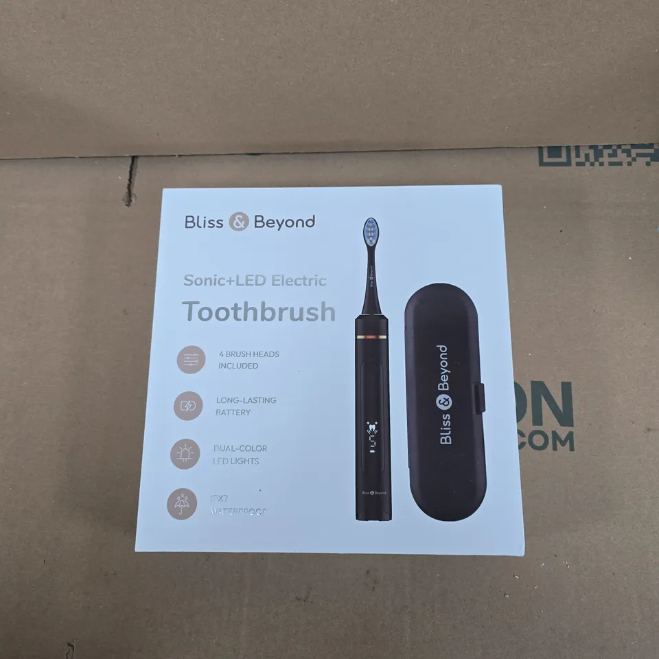 BLISS & BEYOND SONIC+LED ELECTRIC TOOTHBRUSH WITH CHARGING DOCK AND 4 BRUSH HEADS