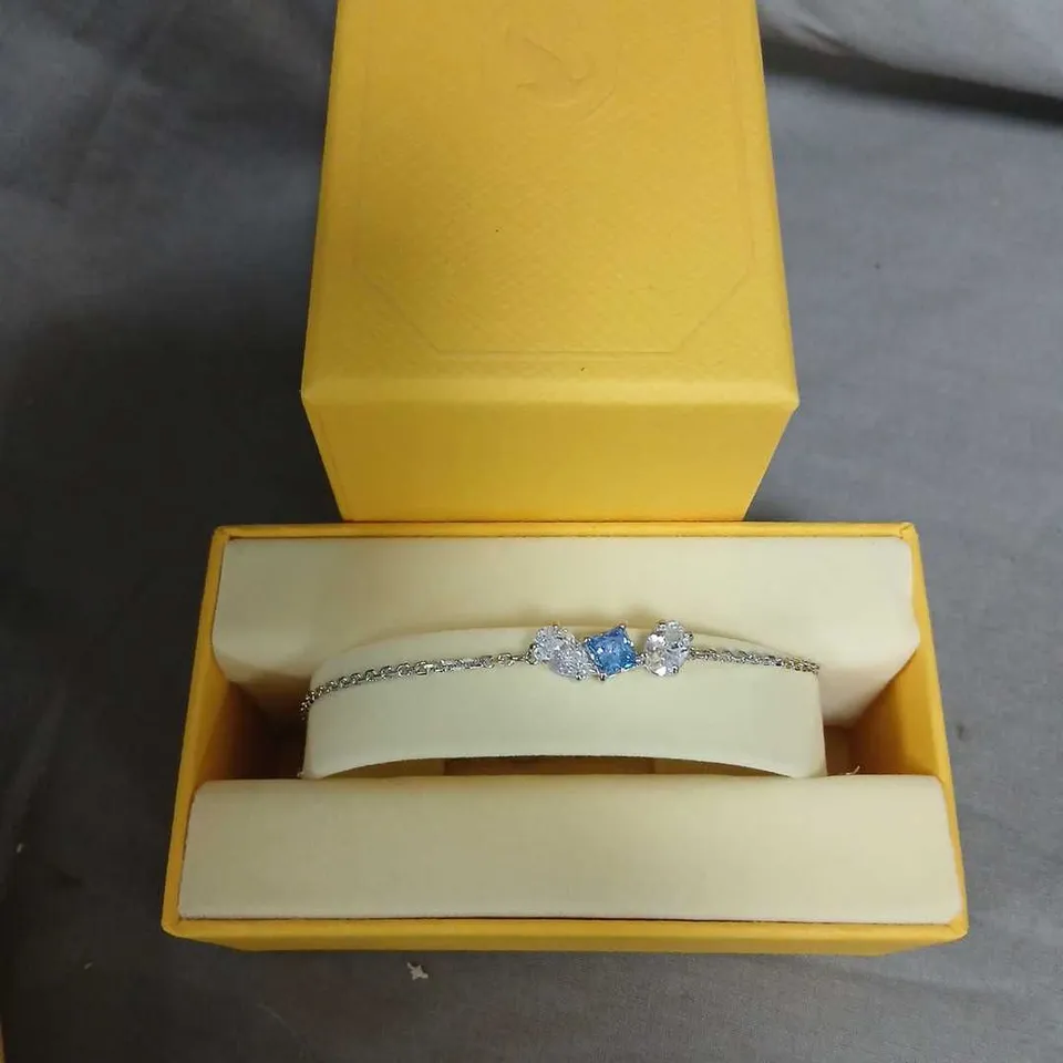 SWAROVSKI SILVER BRACELET WITH BLUE GEMSTONE AND CLEAR STONES – BOXED