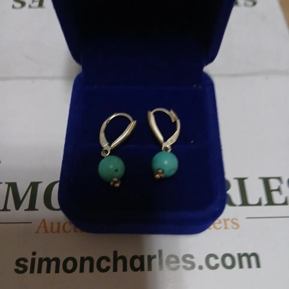 TURQUOISE BEAD LEVER-BACK EARRINGS IN SILVER TONE