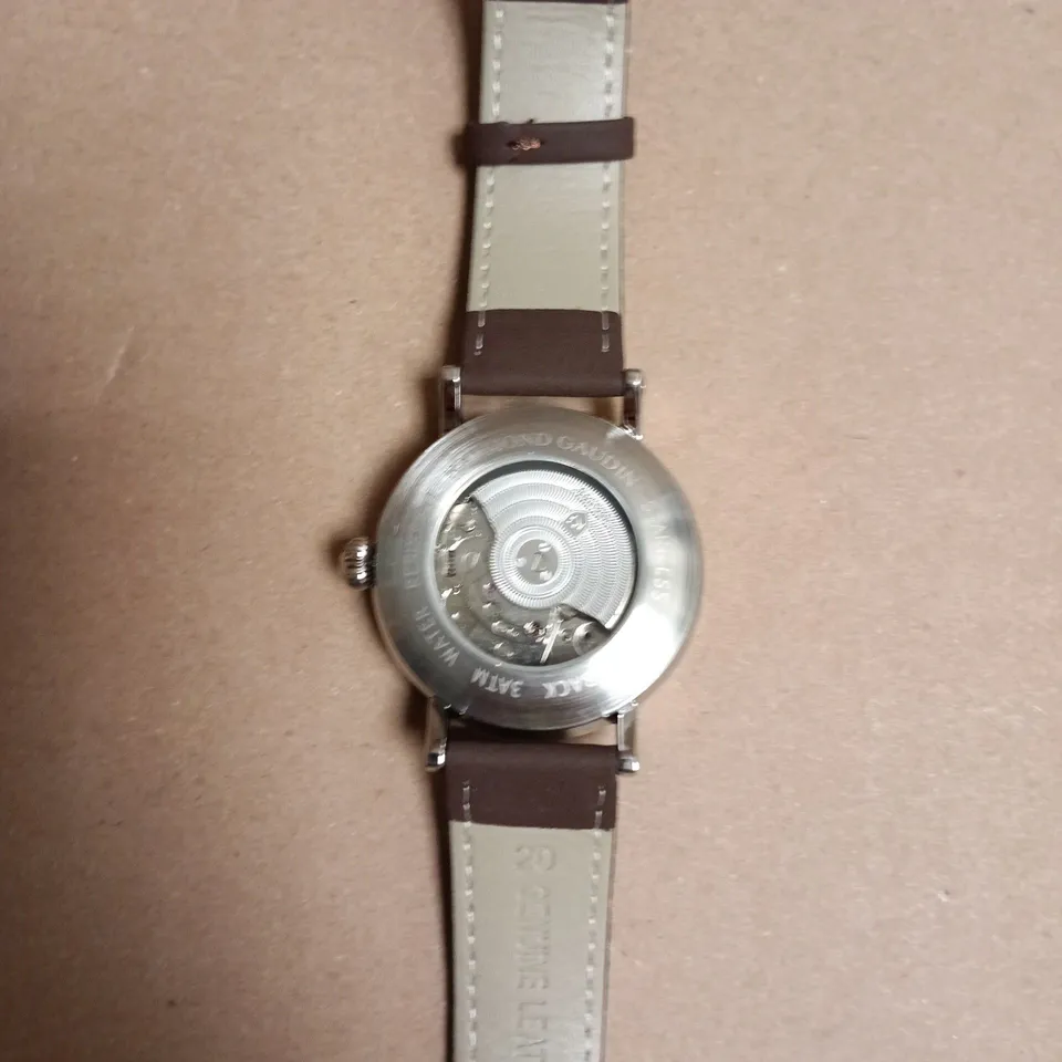 BOXED RAYMOND GAUDIN WRISTWATCH – STAINLESS STEEL CASE, BROWN LEATHER STRAP, EXHIBITION CASE BACK