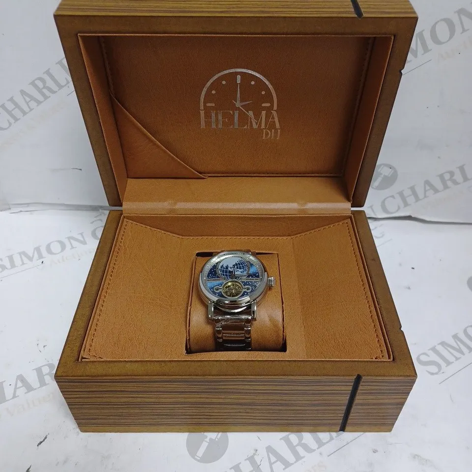 MEN’S HELMA DH AUTOMATIC WORLD VIEW WATCH – TOURBILLON MOVEMENT – BLUE DIAL – STAINLESS STEEL STRAP – GLASS EXHIBITION BACK CASE