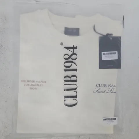 BAGGED CLUB 1984 MELROSE T-SHIRT IN OFF WHITE SIZE SMALL