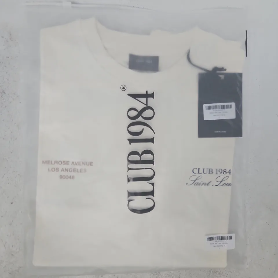 BAGGED CLUB 1984 MELROSE T-SHIRT IN OFF WHITE SIZE SMALL