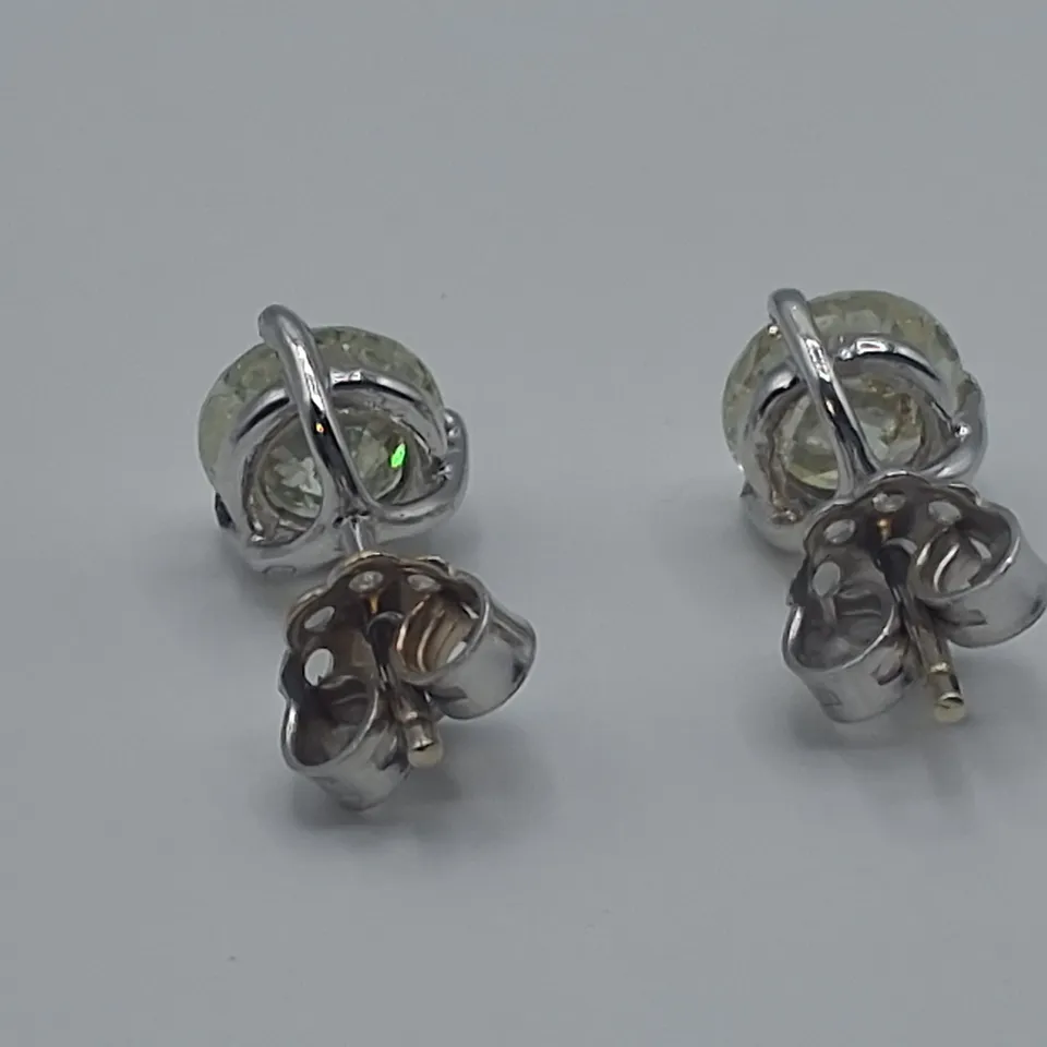 18CT WHITE GOLD STUD EARRINGS SET WITH NATURAL DIAMONDS WEIGHING +-3.09CT
