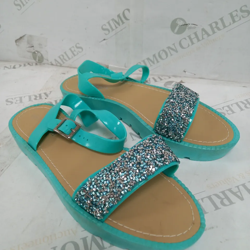 BOX OF APPROXIMATELY 15 ASSORTED PAIRS OF SHOES TO INCLUDE CHAMPAGNE HEELS, GREY BOOTS, BLUE SANDALS ETC