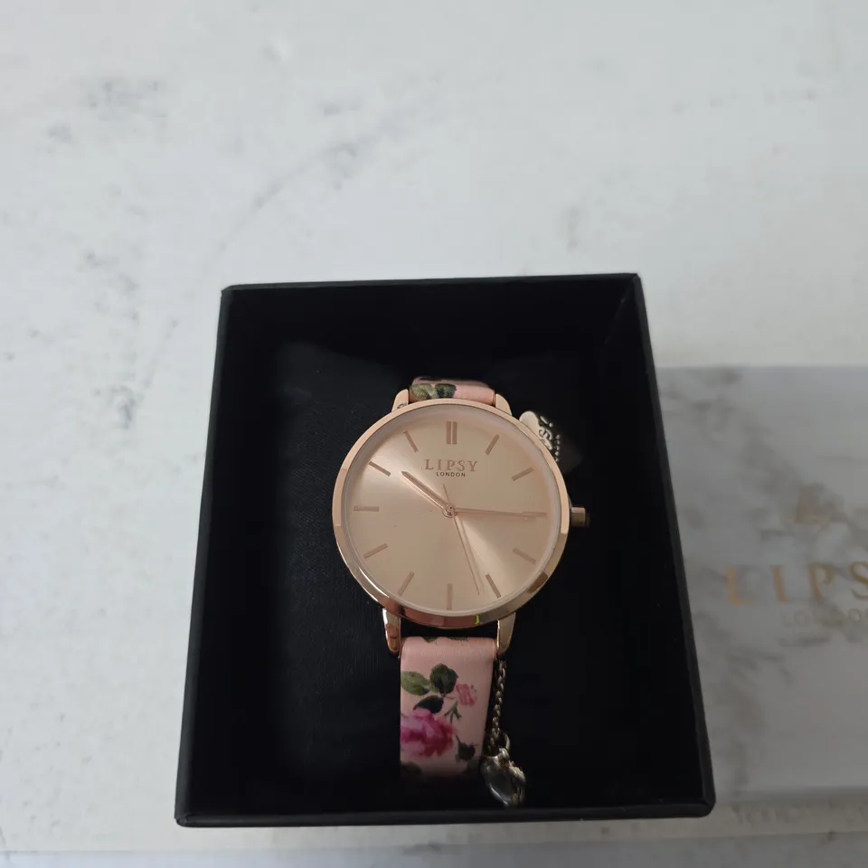 LIPSY LONDON WOMEN'S ROSE GOLD TONE WATCH WITH FLORAL PINK STRAP – BOXED