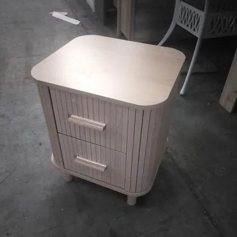 SUIRE LIGHT WOOD BEDSIDE TABLE, FEATURING ROUNDED CORNERS AND FLUTED DRAWER FRONTS