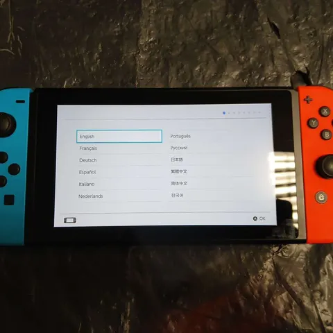 NINTENDO SWITCH CONSOLE WITH NEON RED/BLUE JOY-CONS, DOCK & ACCESSORIES