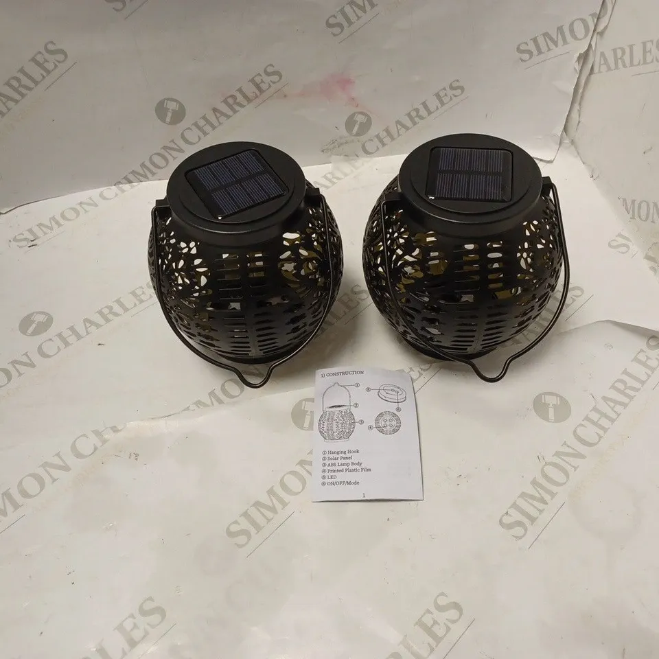 BOXED PAIR OF OUTDOOR LED SOLAR LAMPS, WITH USER GUIDE