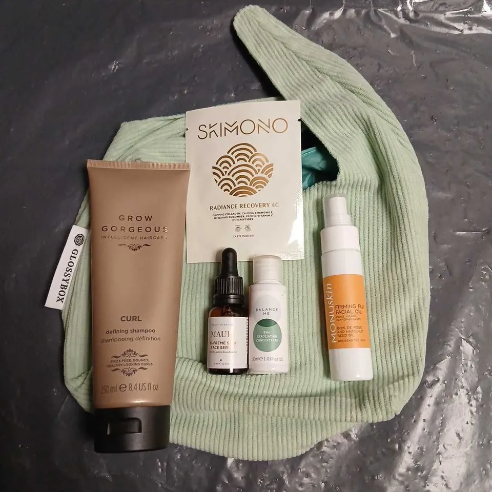 GLOSSYBOX COSMETICS BAG WITH SELECTION OF ASSORTED COSMETIC PRODUCTS