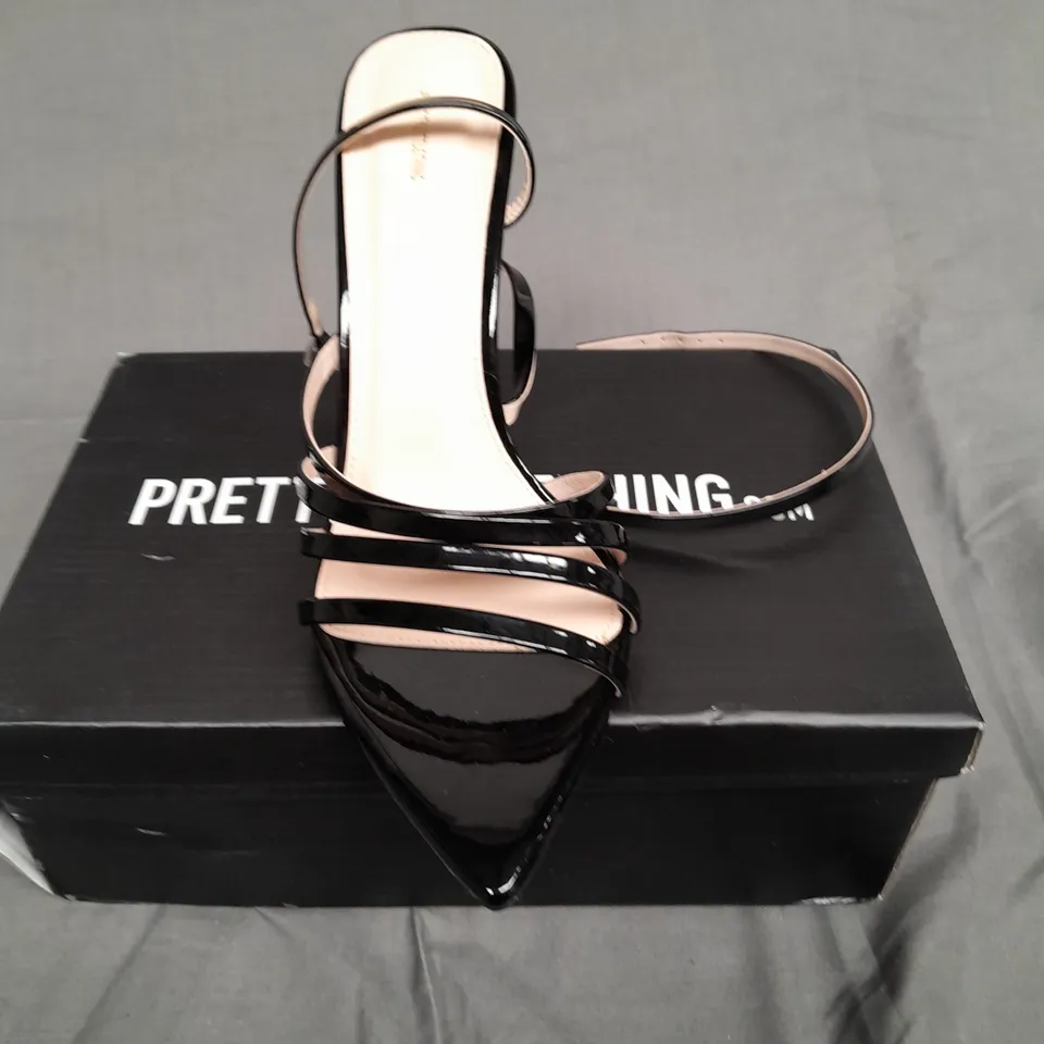 BOXED PAIR OF PRETTYLITTLETHINGS BLACK WIDE FIT POINT TOE STRAPPY STILETTO HEELS SIZE 7 
