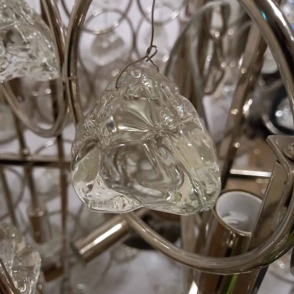 14 LIGHTS ON A SILVER CHANDELIER WITH GLASS ROCKS - COLLECTION ONLY