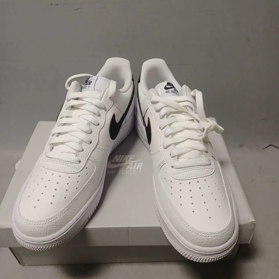 BOXED PAIR OF NIKE AIR FORCE 1 TRAINERS IN WHITE - 9.5