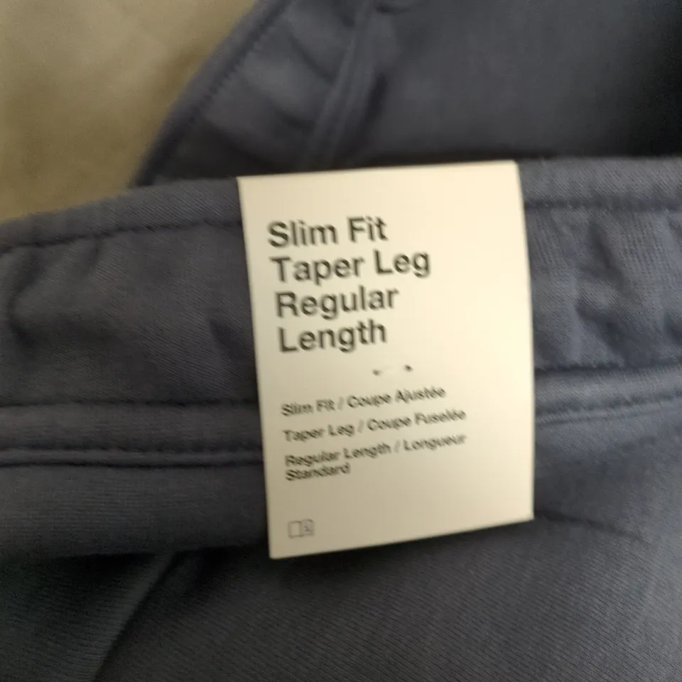 NIKE SLIM FIT TAPER LEG SWEATPANTS – MEN’S NAVY, UK SMALL (S)