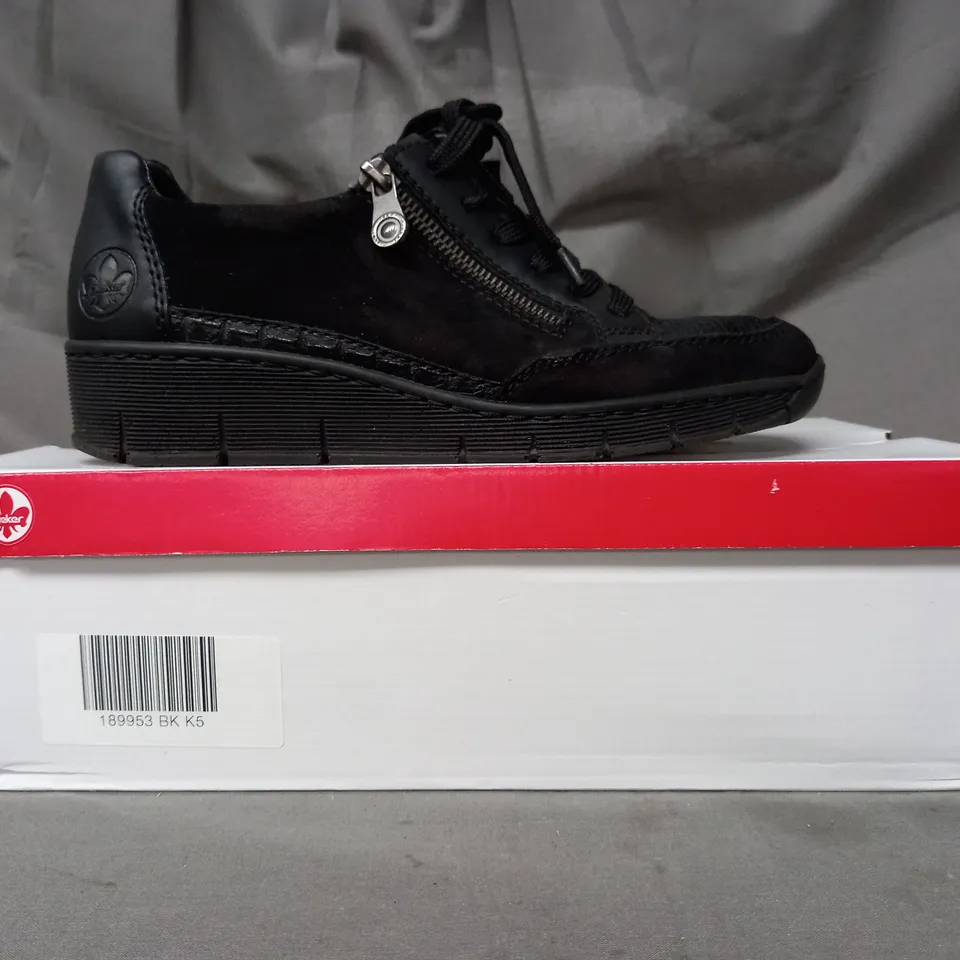 BOXED PAIR OF RIEKER WEDGE TRAINERS IN BLACK SIZE 5