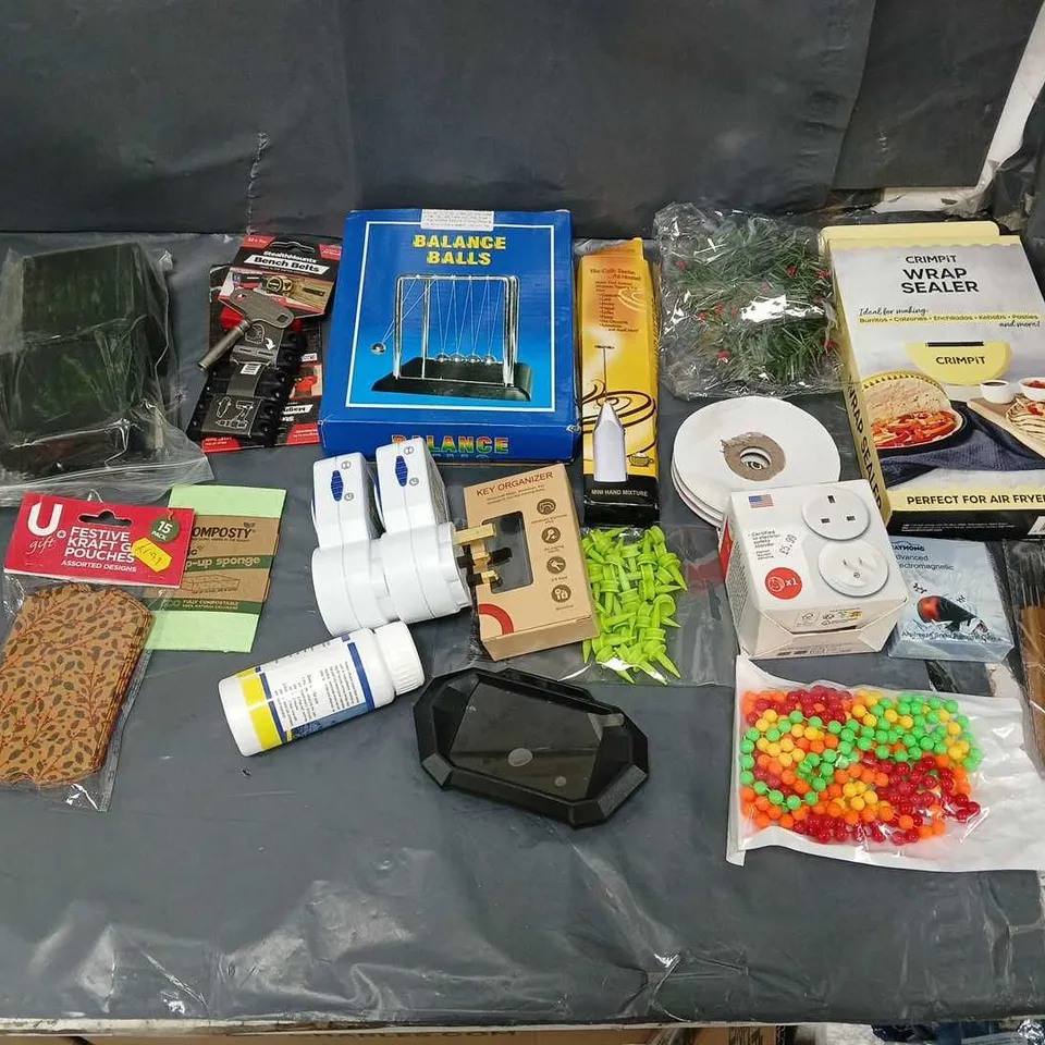 APPROXIMATELY 12 ASSORTED ITEMS TO INCLUDE - BALANCE BALLS, CRIMPIT WRAP SEALER, AND BENCH BELTS ETC. 