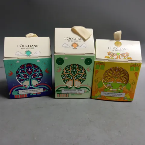 3 BOXED L'OCCITANE GIFT SETS TO INCLUDE ESSENTIAL SHEA TRIO, ESSENTIAL ALMOND TRIO, ESSENTIAL VERBENA TRIO