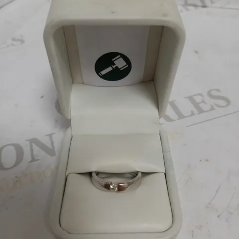 DESIGNER 18CT WHITE GOLD SOLITAIRE RING TENSION SET WITH A DIAMOND