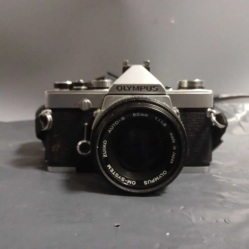 OLYMPUS OM-1N FILM CAMERA WITH CARRY BAG