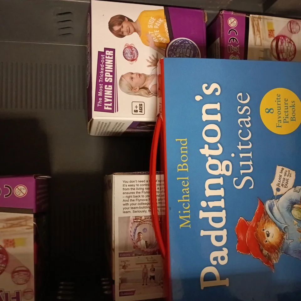 APPROXIMATELY 10 ASSORTED TOYS AND GAMES TO INCLUDE ELF LOTTO, FLYING SPINNER, ETC