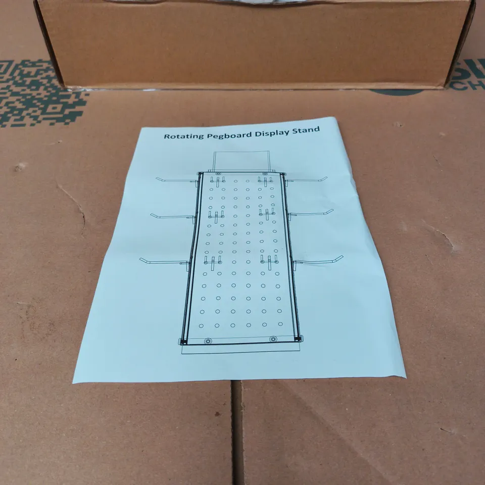 ROTATING PEGBOARD DISPLAY STAND BOXED WITH INSTRUCTIONS
