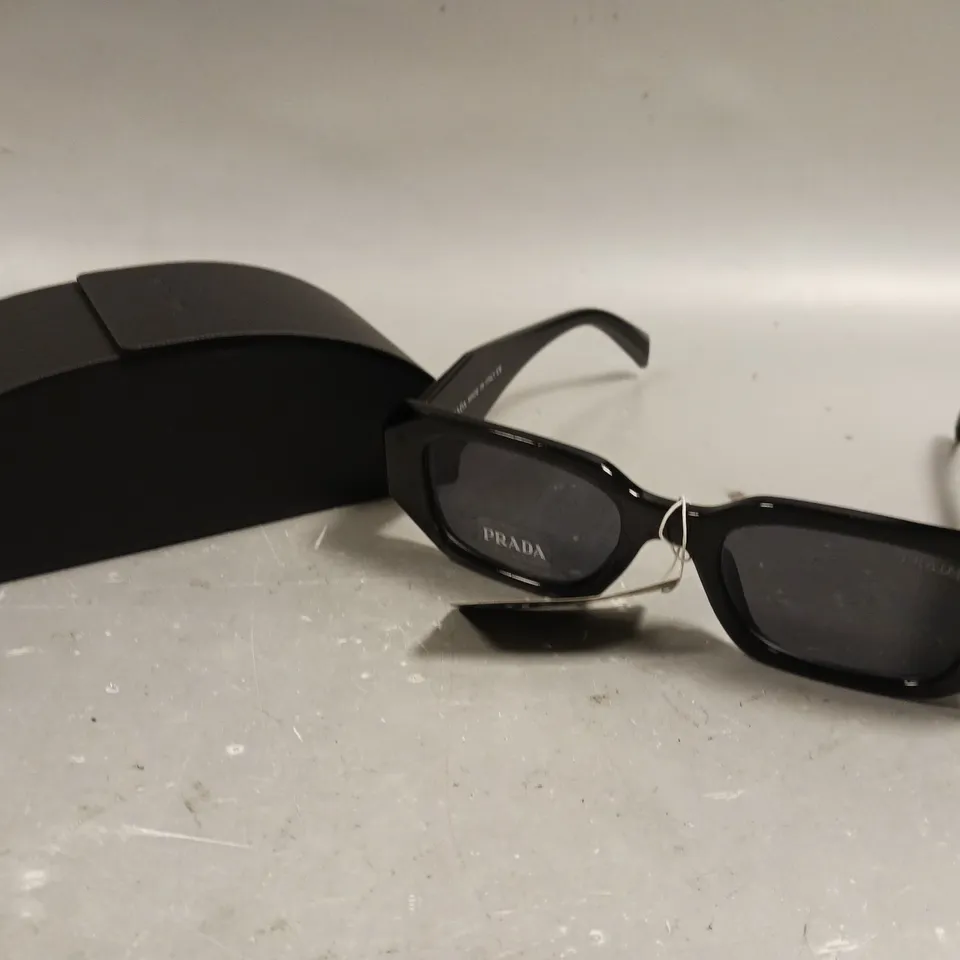 PRADA SYMBOLE BLACK FRAMED SUNGLASSES