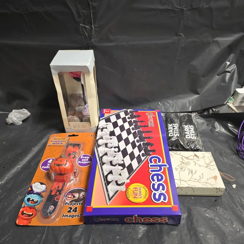 LARGE QUANTITY OF ASSORTED TOYS AND GAMES TO INCLUDE - CHESS GAMES  PROJECTOR WATCH , ETC 