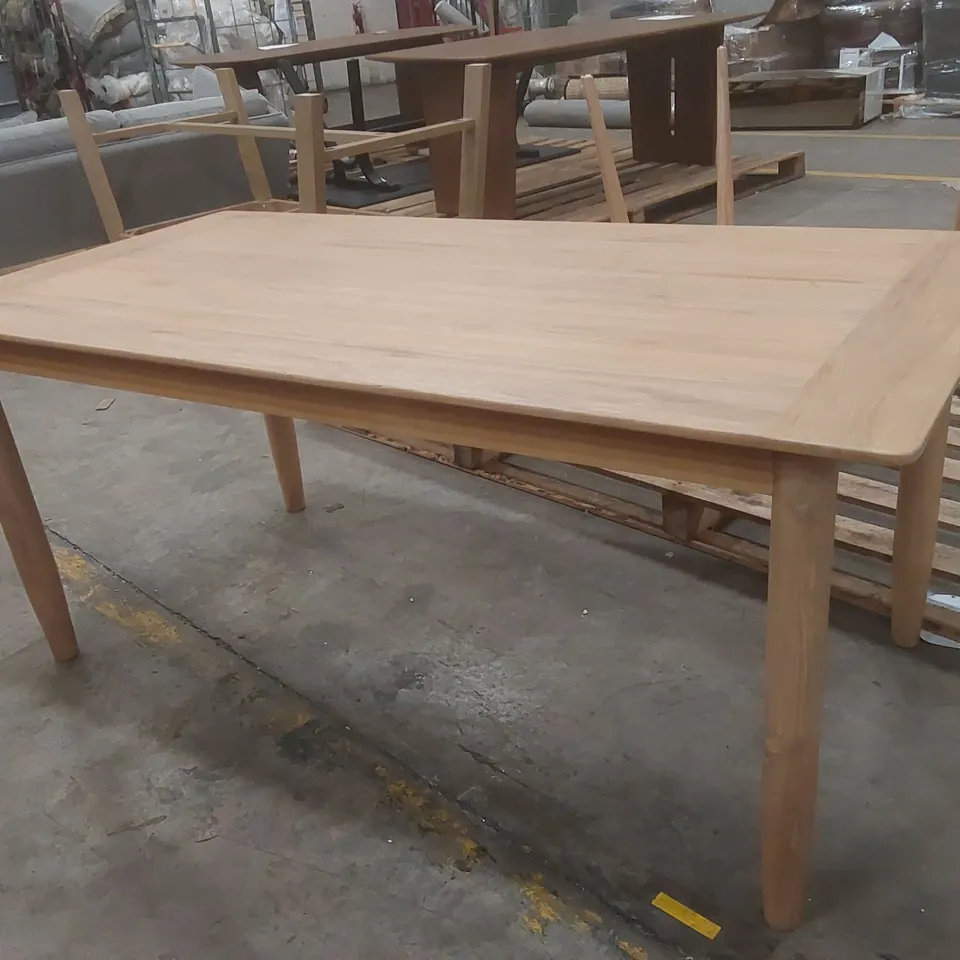 DESIGNER SOLID WOOD DINING TABLE