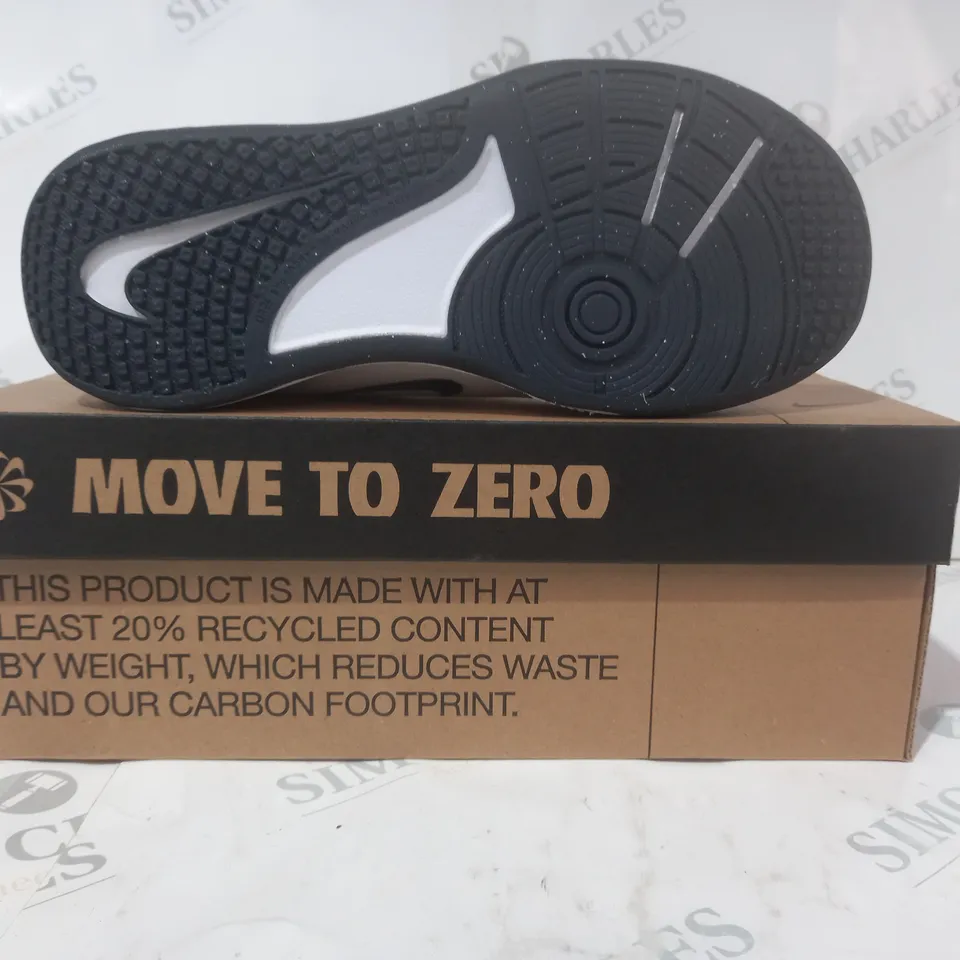 BOXED PAIR OF NIKE OMNI MULTI-COURT SHOES IN WHITE UK SIZE 5