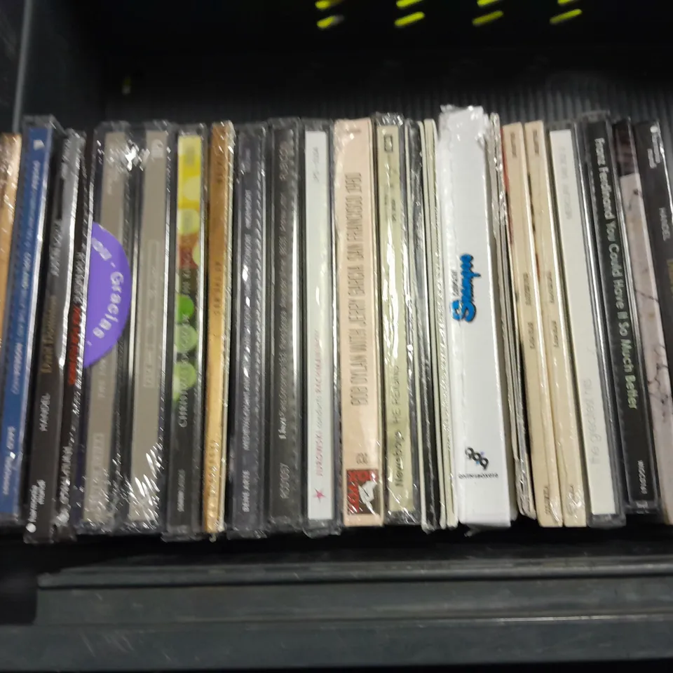 LOT OF APPROXIMATELY 40 ASSORTED MEDIA ITEMS TO INCLUDE MONTY PYTHON SINGS, THE WORLDS GRETEST 3CD SET AND KINGS OF LEON