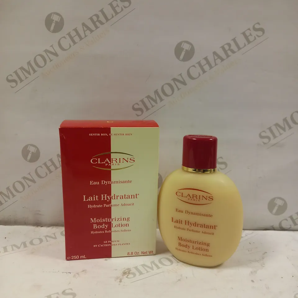 BOTTLE OF CLARINS PAIRS EAU DYNAMISANTE MOISTURIZING BODY LOTION, 250ML