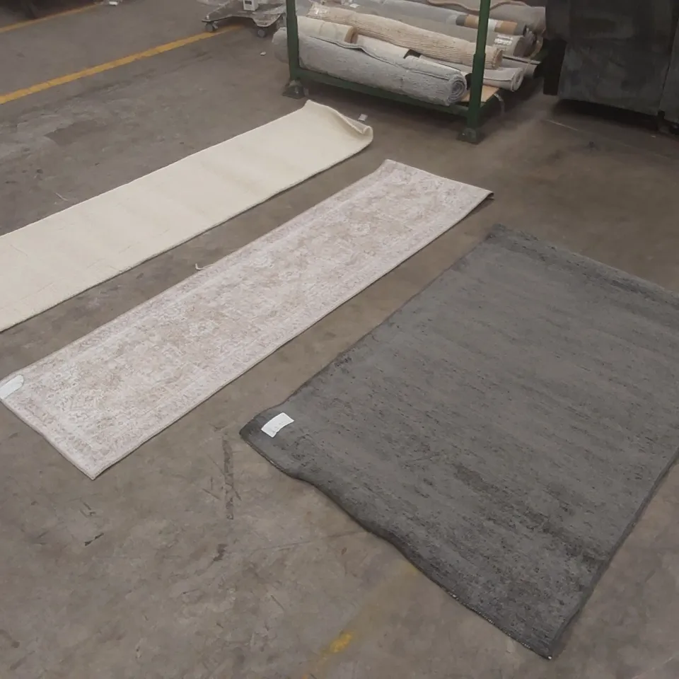 STILLAGE CONTAINING APPROXIMATELY 12x ASSORTED DESIGNER AREA RUGS // STILLAGE NOT INCLUDED