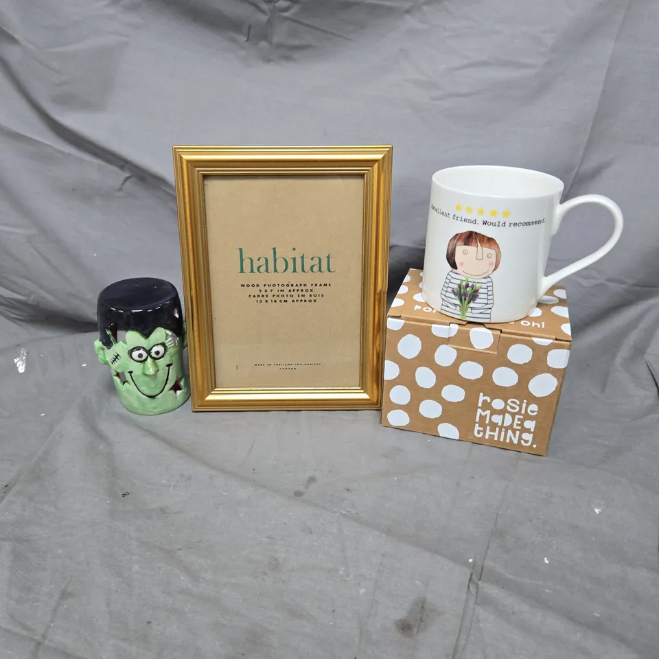 TOTE OF APPROXIMATELY 10 HOUSEHOLD ITEMS TO INCLUDE FRANKENSTEIN TEA LIGHT HOLDER, PICTURE FRAMES AND MUGS