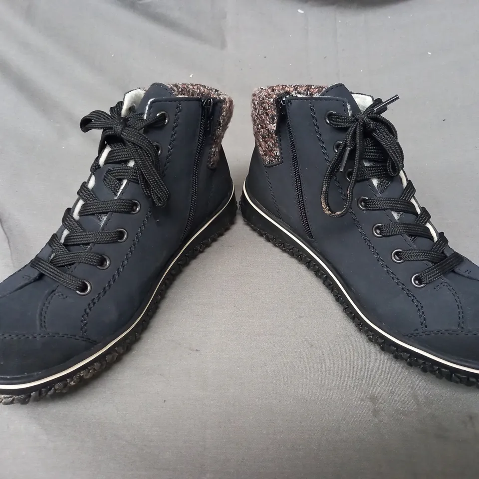 BOXED PAIR OF RIEKER WATER RESISTANT BOOTS IN NAVY SIZE 6