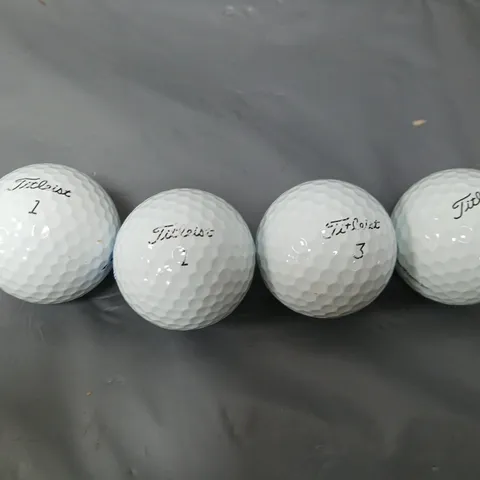 APPROXIMATELY 20 GOLF BALLS TO INCLUDE TITLEIST, ETC