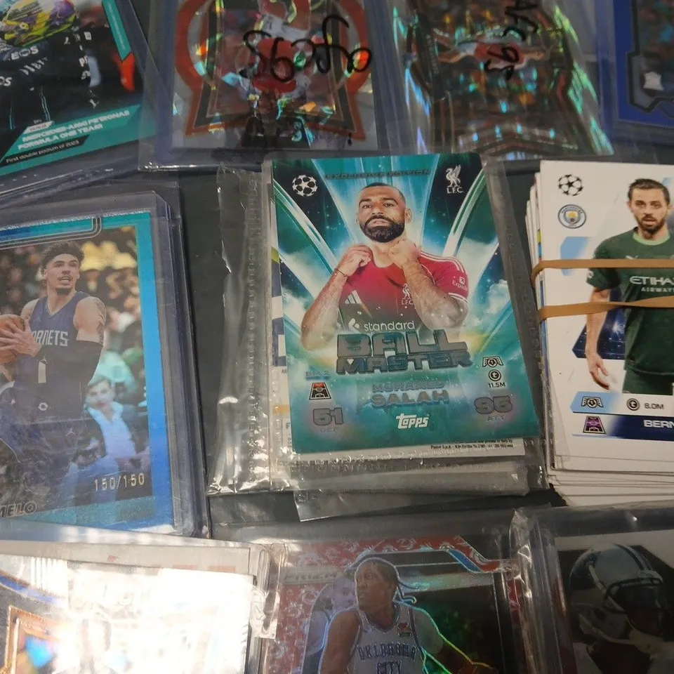 LOT OF ASSORTED SPORTS THEMED COLLECTORS CARDS