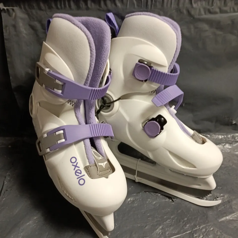 UNBOXED PAIR OD OXELO ICE SKATING BOOTS IN WHITE/PURPLE - UK 11.5C - 13C