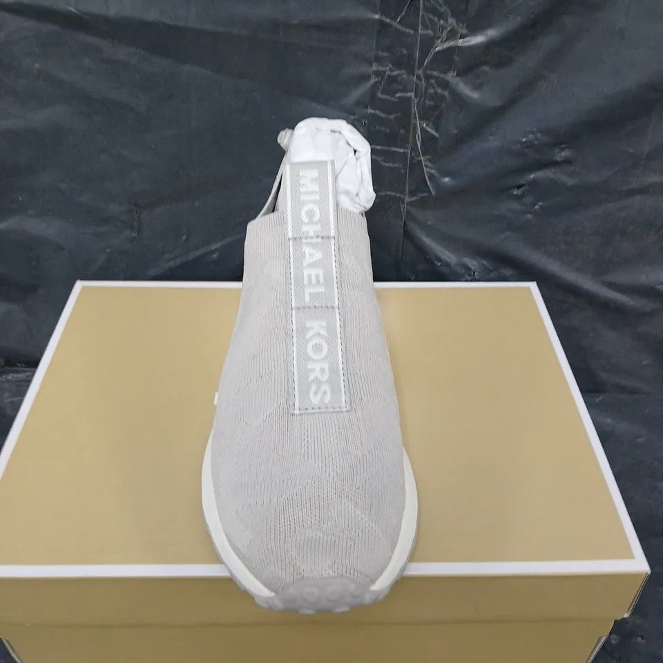 BOXED PAIR OF MICHAEL KORS BODIE SLIP ON TRAINERS - UK SIZE UNSPECIFIED