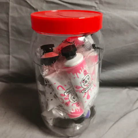 CLEAR PLASTIC CONTAINER OF APPROXIMATELY ASSORTED PATCH PANDA EARPHONES