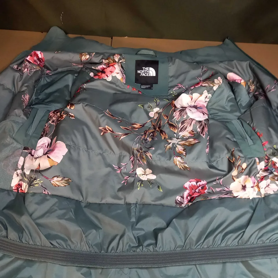 THE NORTH FACE ZIP UP LONG SLEEVE FLORAL DESIGN INNER COAT IN GREY- WOMENS LARGE