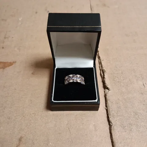RING WITH CLEAR AND BLUE STONES IN A SILVER-TONE SETTING – BOXED 