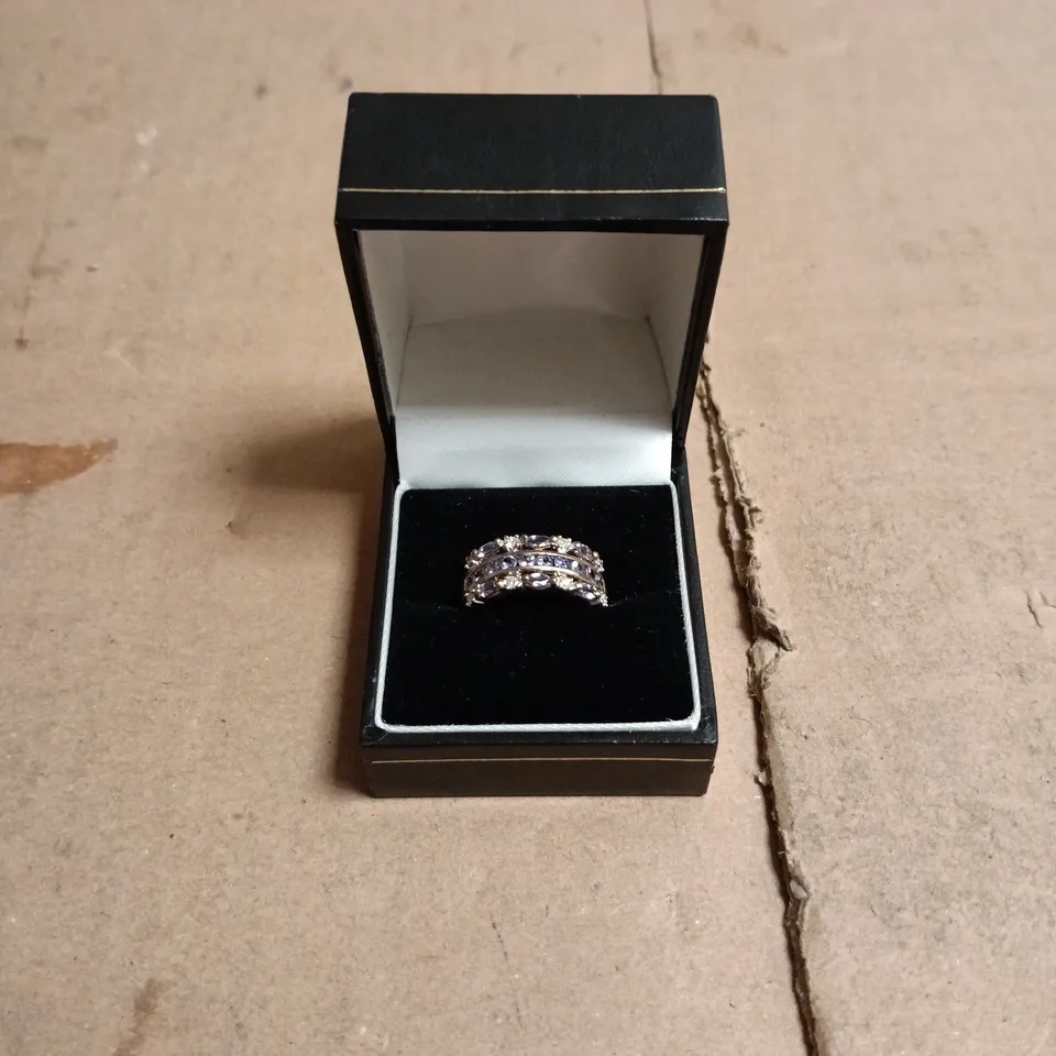 RING WITH CLEAR AND BLUE STONES IN A SILVER-TONE SETTING – BOXED 