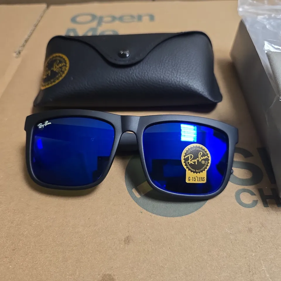 BOXED PAIR OF RAY-BAN SUNGLASSES WITH BLACK FRAME AND BLUE MIRRORED G-15 LENSES