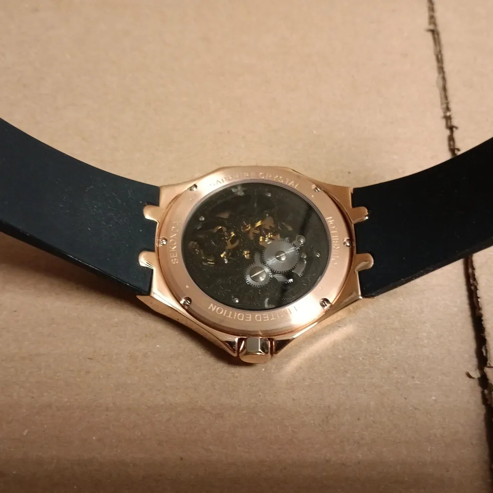 SEKONDA ROSE GOLD TONE SKELETON WRISTWATCH WITH BLACK RUBBER STRAP