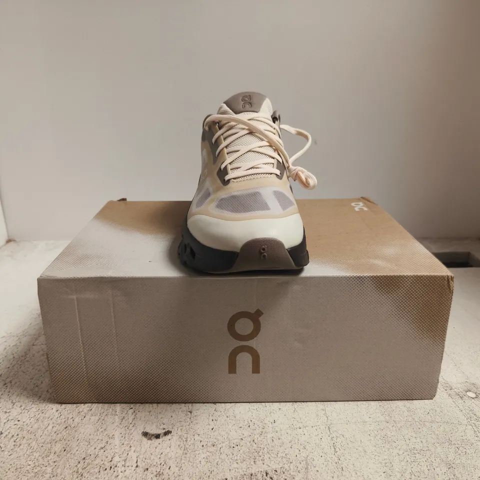 BOXED PAIR OF ON CLOUDTILT REMIX TRAINERS IN DEW/PEBBLE SIZE UK 10