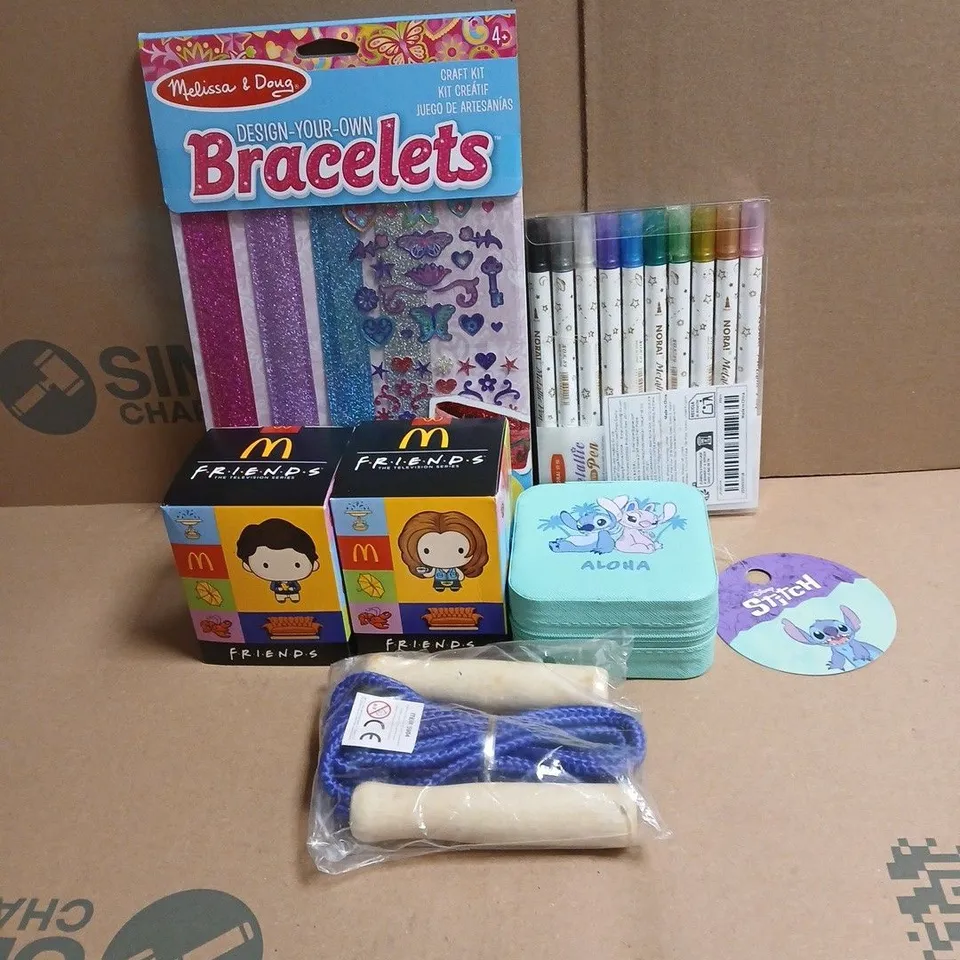 TOTE OF APPROXIMATELY 20 ASSORTED TOYS/RELATED ITEMS TO INCLUDE DESIGN YOUR OWN BRACELETS, PENS, MCDONALDS FRIENDS TOYS, SKIPPING ROPE, DISNEY STITCH BOX ETC