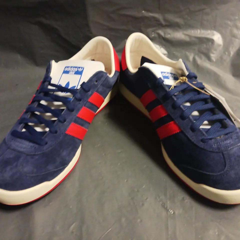 BOXED PAIR OF ADIDAS JAVA SHOES IN NAVY/RED SIZE 7